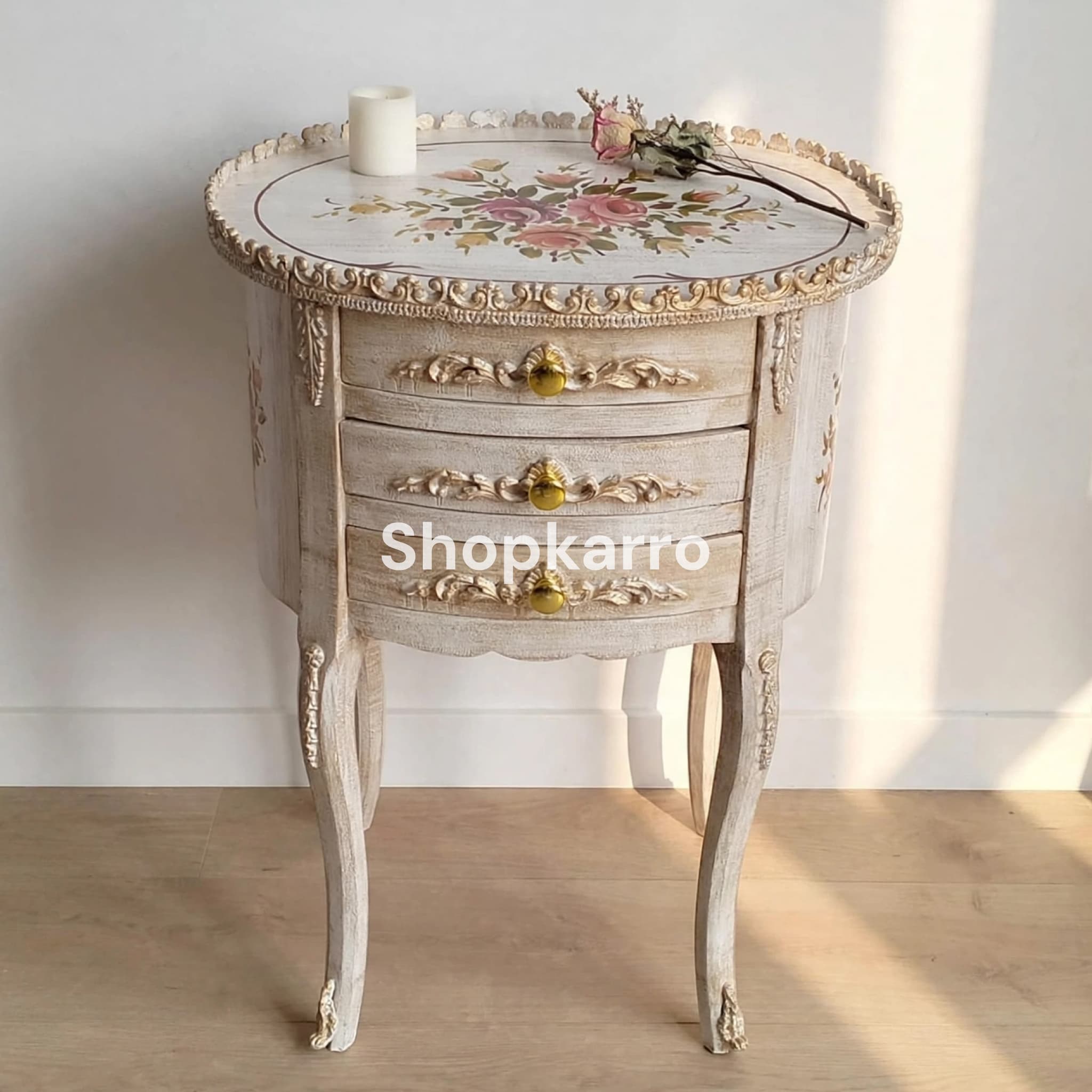 Antique Rose Wooden Table against clean white wall with minimal styling and soft shadow