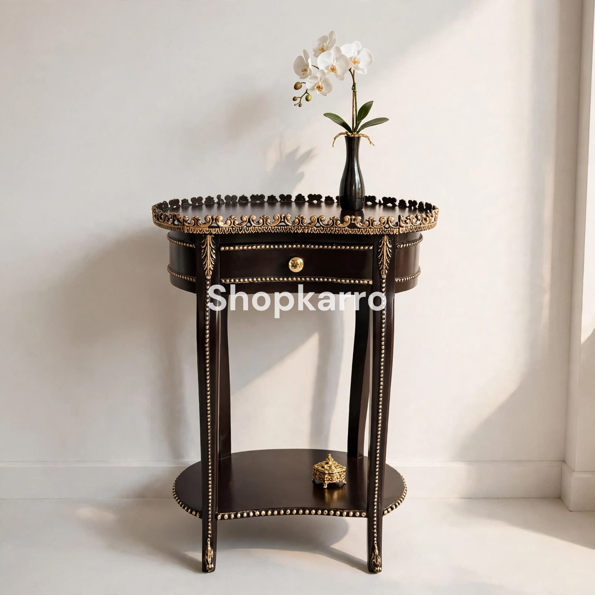 	Side view of Majestic Crown Wooden Table showing gold beaded edge trim and lower oval shelf