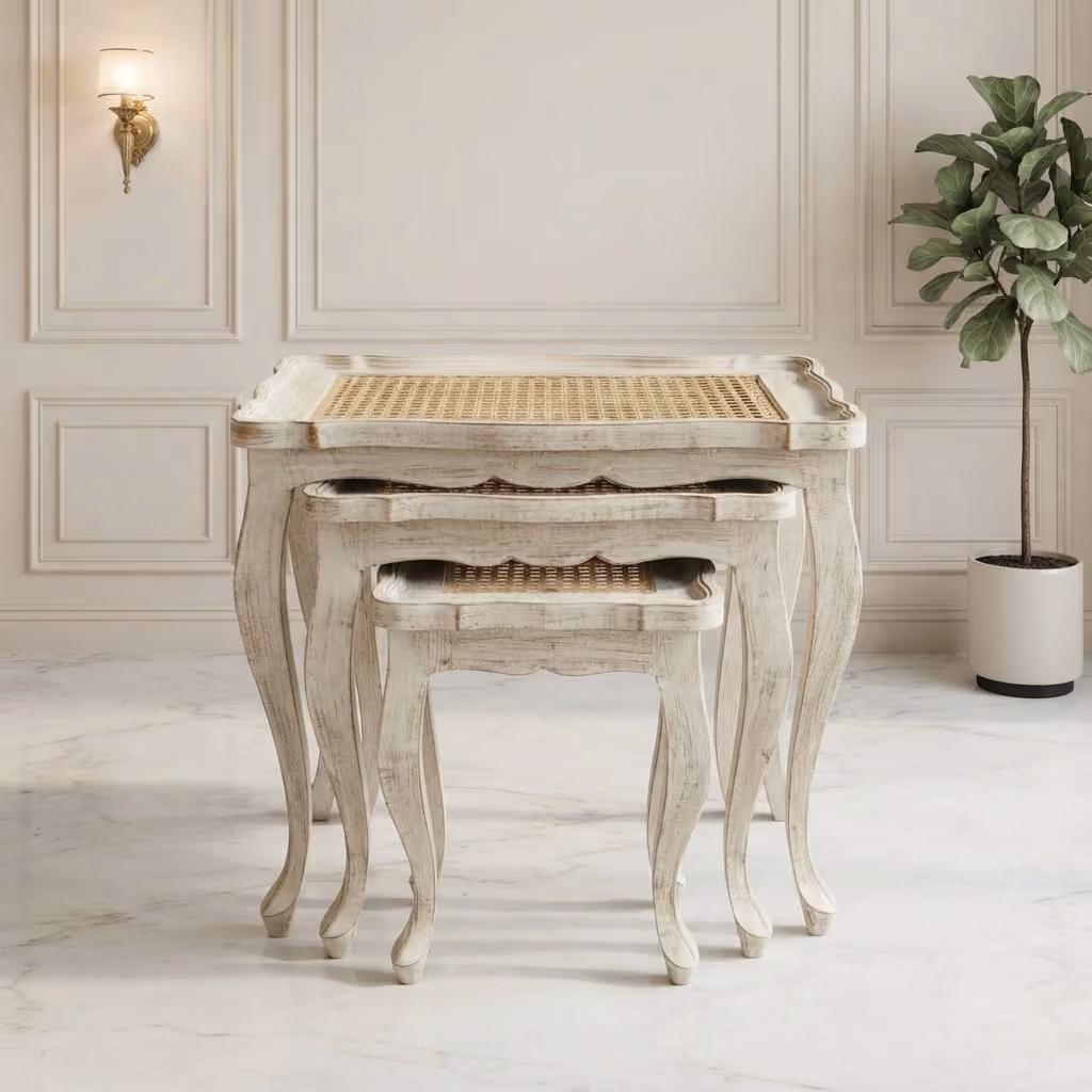 Nordic Cane Nesting Tables nested together, showcasing curved cabriole legs and woven cane tabletops